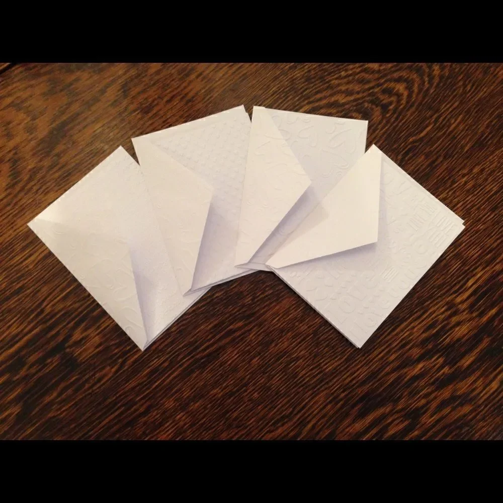 4 Hand made embossed blank love theme cards‎